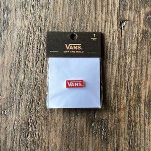 Vans Red pin with white Vans logo. Would be great to put on a lanyard. NWT